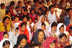 Pakistan.MC.churchmeeting.praying.people